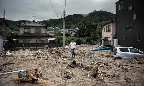 Landslide warnings as Japan digs through rain devastation
