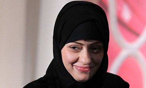 In this 2012 photo, Samar Badawi is presented with an International Women of Courage Award by the US Secretary of State and the first lady during a ceremony at the State Department in Washington, DC.— AFP