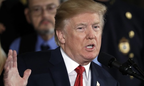 Trump condemns racism year after Charlottesville