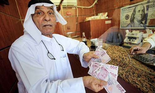 Erdogan says lira crash 'political plot' against Turkey