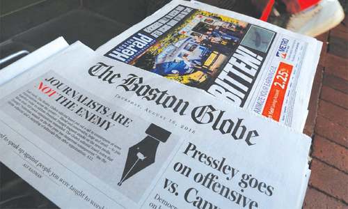 US newspapers hit back at Trump, defend free press