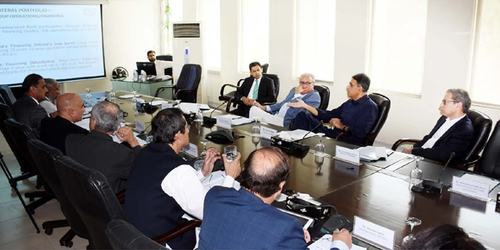 Asad pores over debt data, to meet with SBP governor soon