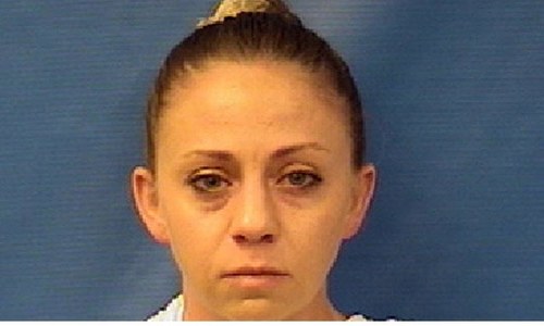 US police woman held for shooting black man in wrong apartment