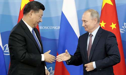 Putin says Russia and China to reduce use of dollar in trade