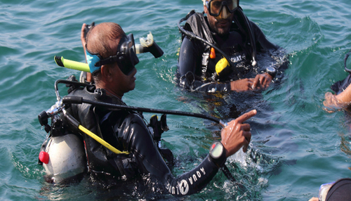 How a handful of certified divers have been removing litter from the Arabian Sea