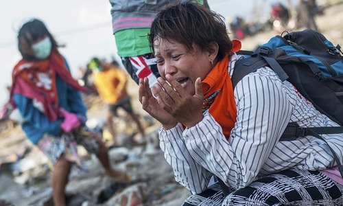 In pictures: Destruction and defiance after Indonesia's quake-tsunami disaster In pictures: Destruction and defiance after Indonesia's quake-tsunami disaster