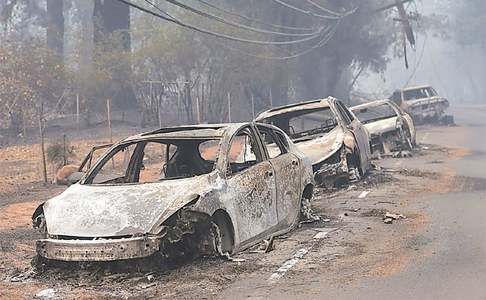 Nine die in California wildfires, hundreds of thousands forced to flee