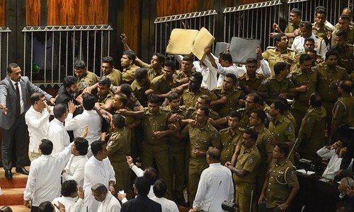 Chilli, punches thrown as Sri Lanka parliament brawls for second day