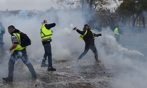 French 'troublemakers' clash with police during Paris protest; 63 arrested French 'troublemakers' clash with police during Paris protest; 63 arrested