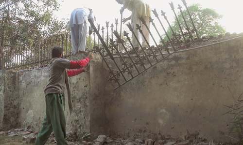 Work on demolition of Governor  House outer wall begins