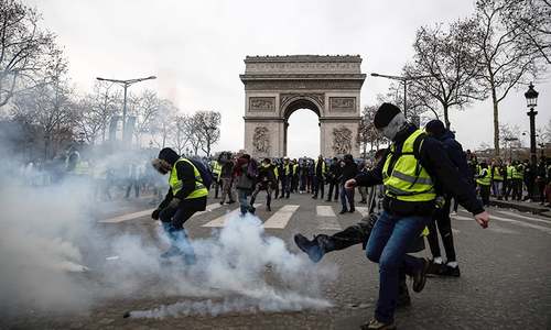 Barricades burn as new 'yellow vest' protests hit Paris