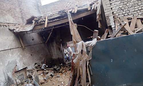 Man killed, son injured in factory roof collapse