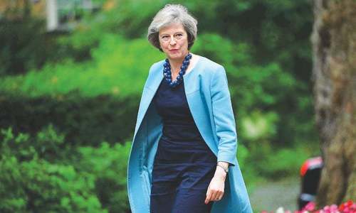 May, Blair trade Brexit snipes