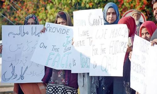 Protesters demand retrieval of QAU land