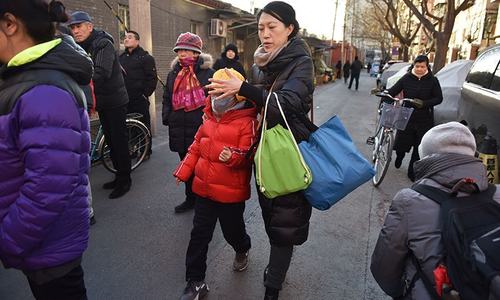 Attacker hurts 20 children with hammer at Beijing school Attacker hurts 20 children with hammer at Beijing school