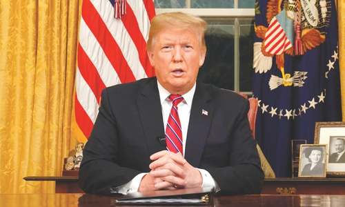 Trump insists on steel wall with Mexico in prime-time speech