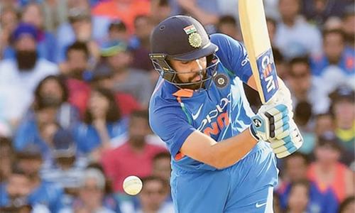 Australia thwart Sharma ton to clinch first ODI