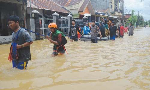 Death toll from Indonesian floods, landslides climbs to 59