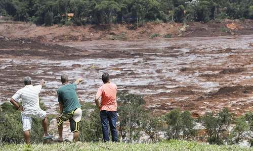 58 dead as firefighters search mud on third day after Brazil dam collapse