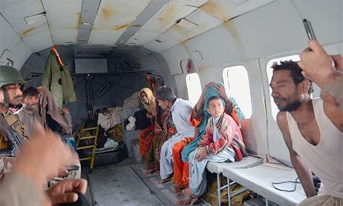 Rains kill eight in KP; hundreds rescued in Balochistan