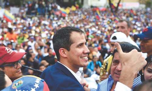 Venezuela's Guaido tells Maduro pressure 'just beginning'