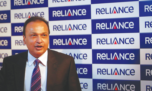 Indian tycoon Ambani pays debt after court threatened jail