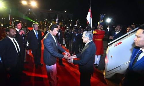 PM Khan receives Malaysian premier Dr Mahathir at Nur Khan airbase