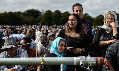 In pictures: Defiance, tears and joy as New Zealand unites a week after mosques massacre