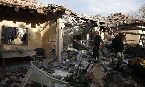 Israel carries out air strikes in Gaza after rocket attack near Tel Aviv