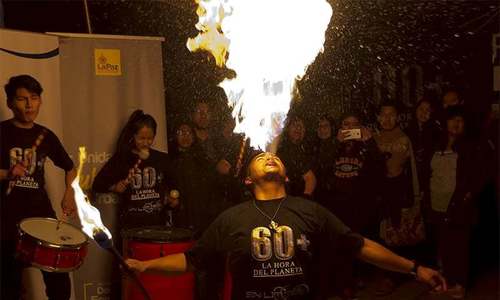 In pictures: Cities go dark for Earth Hour, bring light to climate change