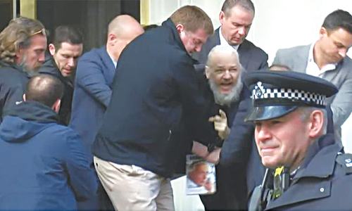 Assange arrested in London on US request