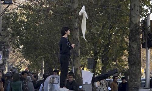 Iranian woman who removed headscarf as public protest sentenced to 1 year in prison