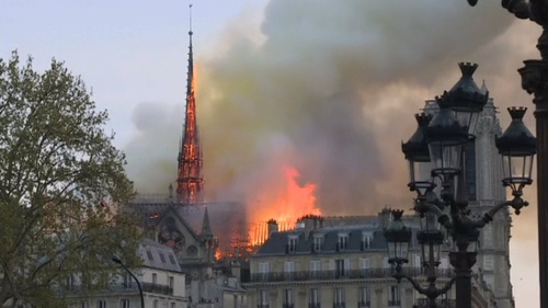 'Paris is disfigured': Tears and shock as Notre-Dame burns 'Paris is disfigured': Tears and shock as Notre-Dame burns
