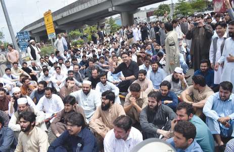 Doctors stage rally against district health authority system