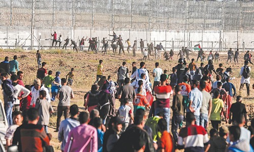 Three Palestinians killed in Gaza after Israel says soldiers wounded