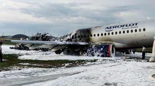 Russia probes pilot error after deadly plane blaze Russia probes pilot error after deadly plane blaze