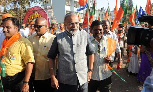 'I am the original': Modi lookalike hits campaign trail
