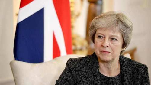 Embattled May dangles promise of new Brexit vote