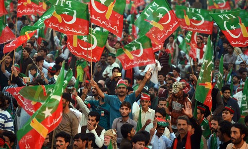 PTI dissolves all its wings before restructuring