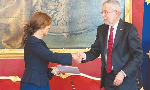 Austria swears in first woman chancellor, pledges stability