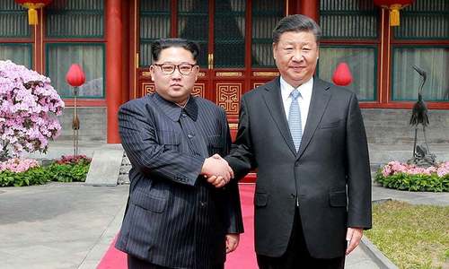 China's Xi holds talks with Kim Jong Un in North Korea
