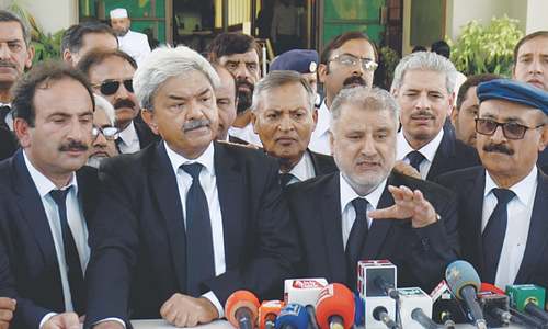 SJC holds brief hearing on references against two judges