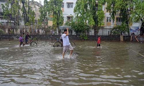 Dam bursts in India after rains, killing 11