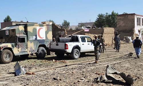 Taliban car bomb kills at least 14 as group holds peace talks in Qatar