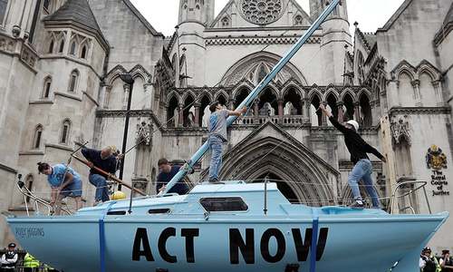 Climate activists disrupt British cities with 'non-violent civil disobedience'