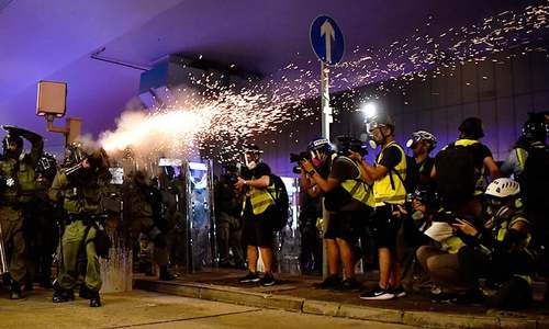 Hong Kong police launch tear gas in latest mass protest