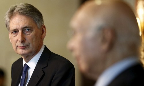 UK finance minister strikes blow as Johnson prepares to become PM