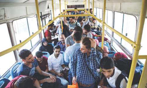 Deported from Turkey, Syrians return to unfamiliar country