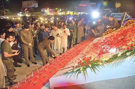 Political leadership, army chief pay homage to martyred police Political leadership, army chief pay homage to martyred police