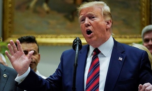 Trump calls on US lawmakers to pass gun background check law after deadly shootings